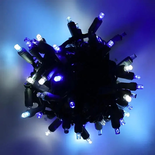 70 5mm ColorCraft® Arctic - Blue, Cool White, and Teal DreamSpark® Slow Fade LED Christmas Lights, 4" Spacing, Green Wire