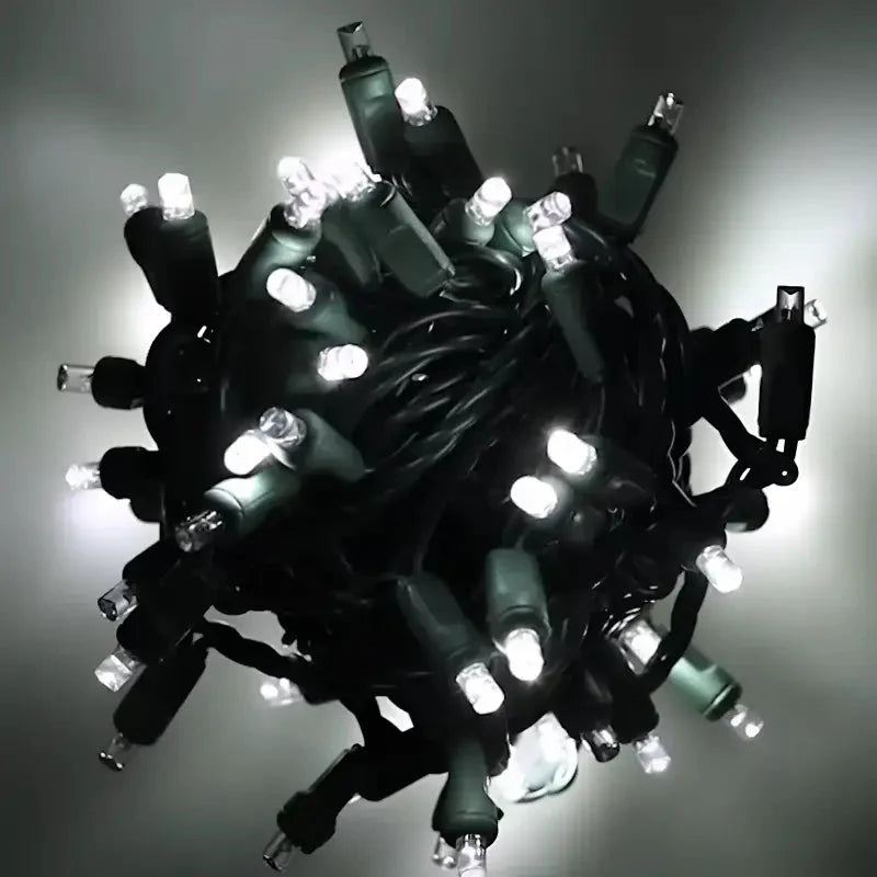 70 5mm Cool White DreamSpark® Slow Fade LED Christmas Lights, 4" Spacing, Green Wire